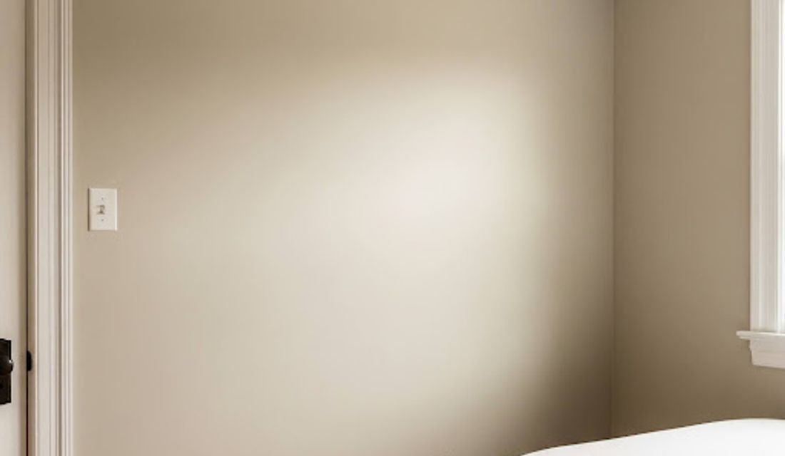 Dark blue accent wall in a modern room