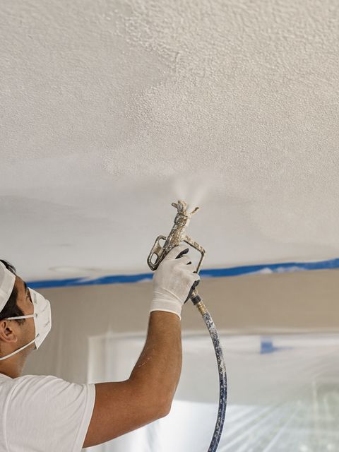 Smooth ceilings after popcorn texture removal by Medrano's Painting