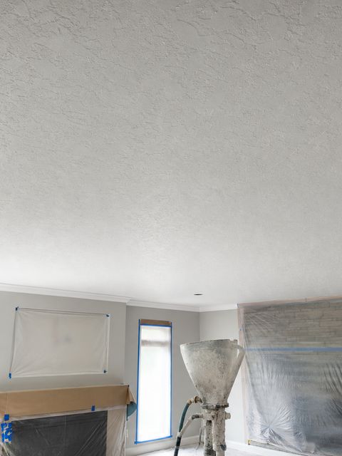 Smooth ceilings after popcorn texture removal by Medrano's Painting