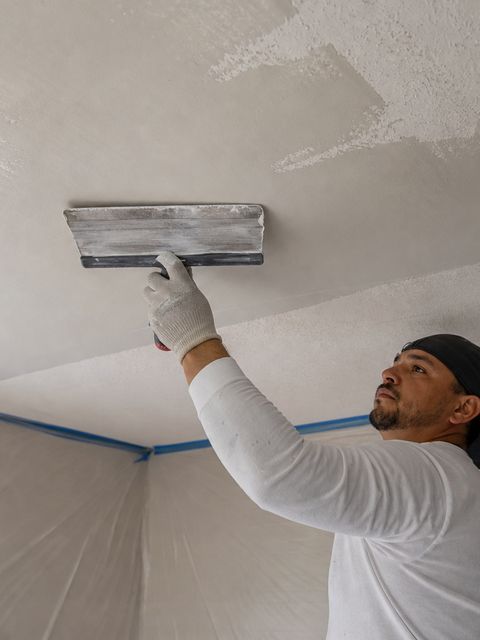 Smooth ceilings after popcorn texture removal by Medrano's Painting